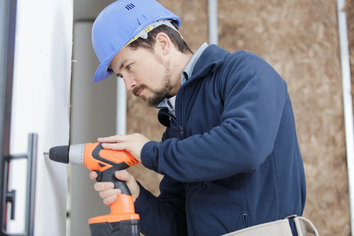 Perçage et fixation d'une serrure multipoint sur une porte renforcée à Villejuif